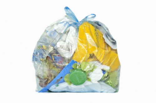 Workers sorting commercial recycling at a depot in Belmont